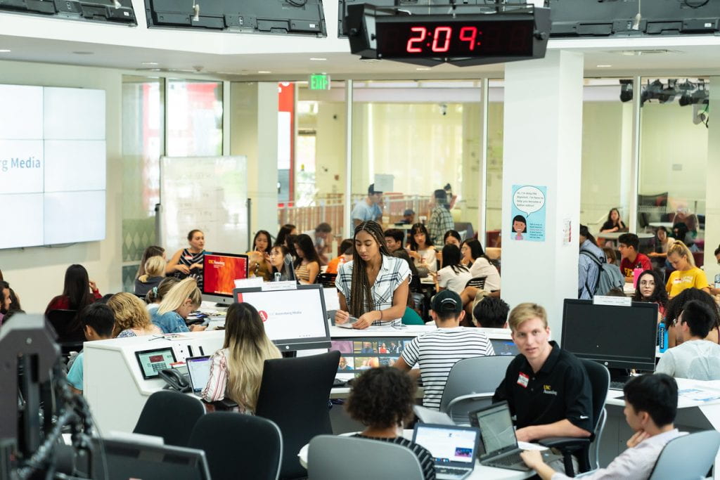 students working in the newsroom inside of Annenberg